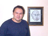 Рауль Еркимбаев с портретом Путина