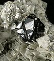 Cassiterite-Muscovite-Albite-260126.jpg